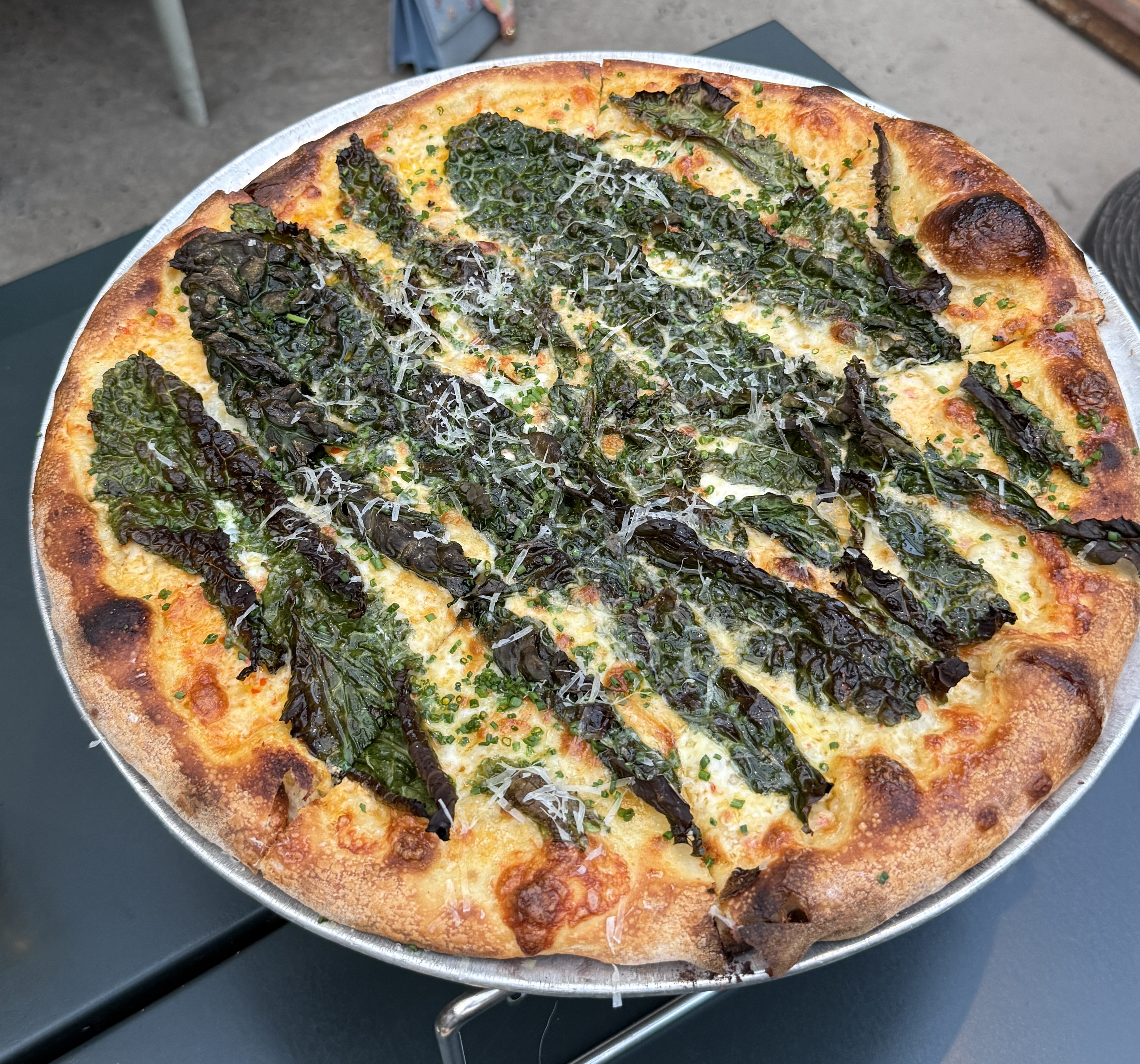 Greens and Calabrian cream pizza at Pizzeria Beddia